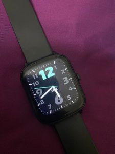Sleek Black Smartwatch With Charger
