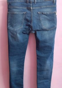 Distressed Denim Jeans
