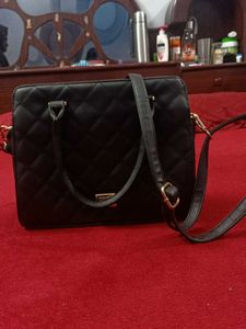 Pure Leather Black Handbag.