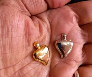 Solid Metalized Silver And Gold Plated Pendents.