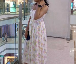 woman floral dress