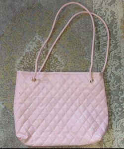 pink hand bag