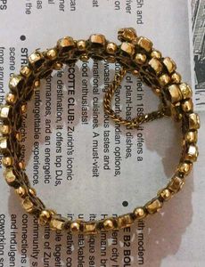 Stunning Gold-Toned Bangle Bracelet with Faux Diam