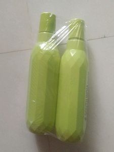 2 Green Plastic Bottles