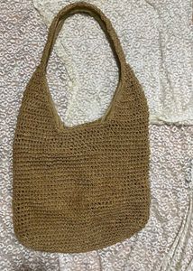 Woven straw shoulder bag