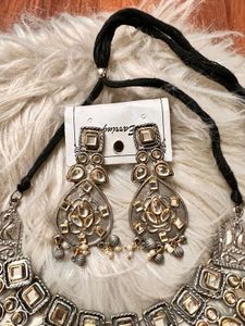 Neckpiece and earrings
