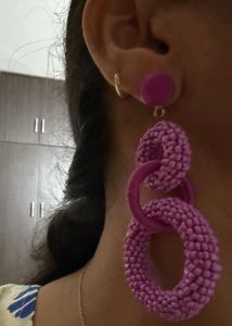 Purple/ mauve dangling earrings