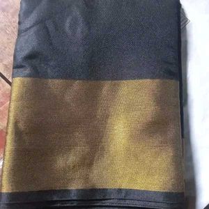 BLACK SAREE WITH GOLDEN BORDER