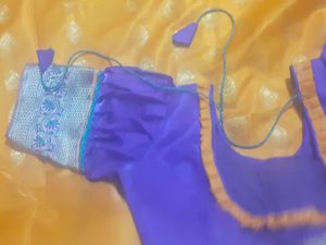 mango colour saree with ready stitched pattern blouse....