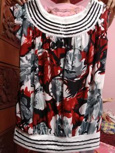 Top with sequins work around neck