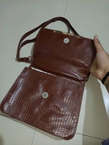 brown handbag crocodile pattern