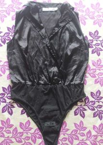 blacksatinbodysuit with a collared, wrap-style Top