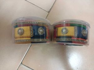 2 Sets Of Multi Colour Thread Bangles