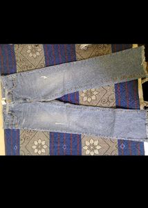 Distressed Light Wash Denim Jeans