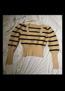 Its a Honeycomb Sweater With Yellow Black Straps