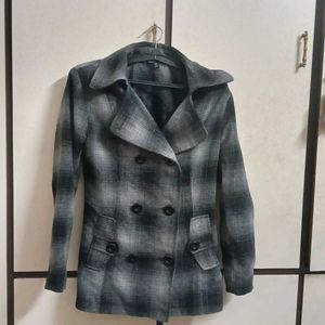 black and grey check mid length coat