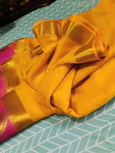 Yellow Saree With Pink Border