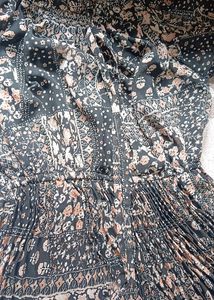 Black ruffle georgette gown.