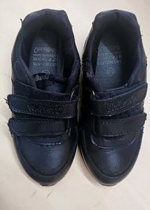Lightly used Black Shoes for a Kid