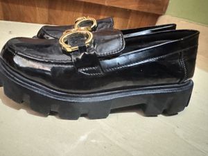Black Loafers with Gold Detail