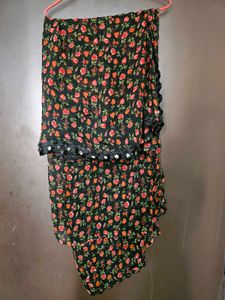 Floral Print Black Saree with red blouse