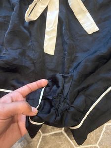 black satin shorts