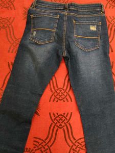 Distressed Denim Jeans