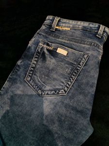 Distressed Denim Jeans