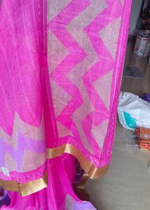 Magenta Tissue Saree with Silver Zari Border