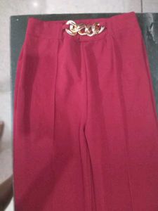 Maroon Wide-Leg Pants with Gold Chain Accent