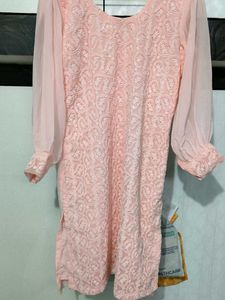 This pink colored georgette Plazo Suit