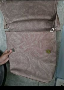 very cheap  beige coloured sling / crossbody bag