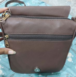 BRAND NEW SLING BAG.