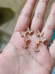 Giva Rose Gold Butterfly Drop Earrings