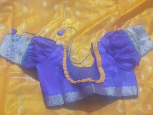 mango colour saree with ready stitched pattern blouse....