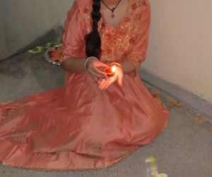 Elegant Orange Kurta Set with Embroidered Details