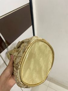 Elegant Gold Embroidered Potli Bag