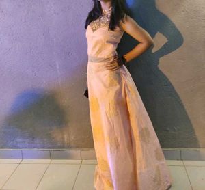 Elegant Peach And Golden Gown