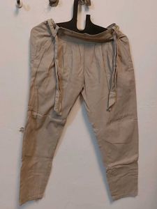 Beige belted pants