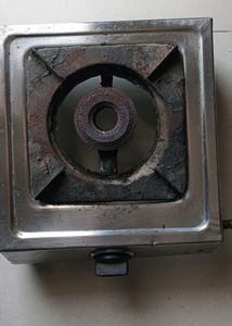 Old Gas Stove With Pipe