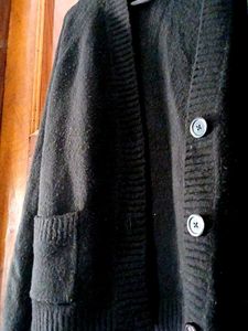 Black Knit Cardigan And Red Sweater