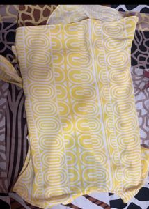 It’s a yellow and white combination top