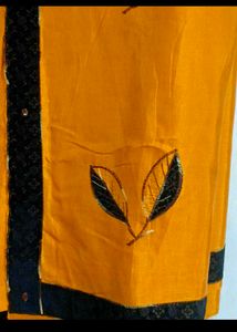 Mustard And Black Embellished Saree