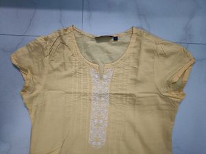 L srishti short sleeve knee length yellow kurti