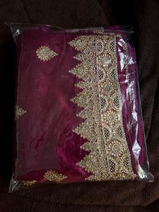 Elegant Maroon Embroidered Saree