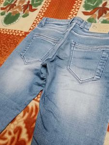 Distressed Denim Jeans