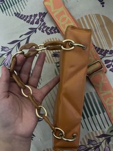 Swiss Beauty Eye Patches And Orange Quilted Bag