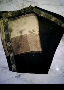 pretty olive black saree.