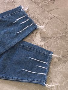 Distressed Hem Denim Jeans
