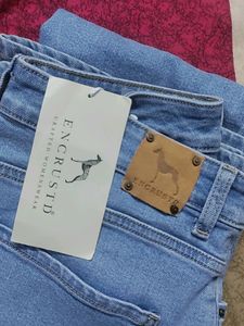 full length flared blue jeans
